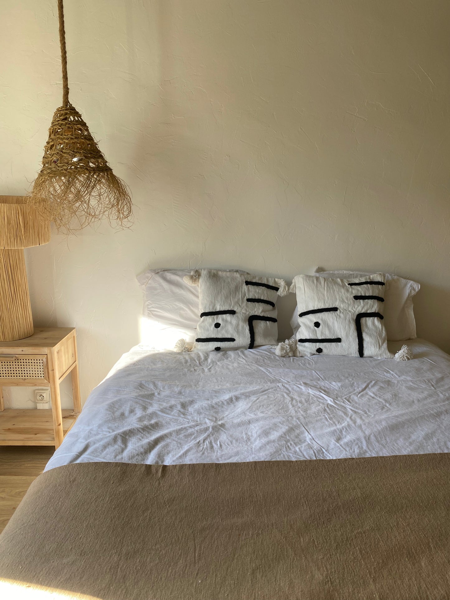Housses de coussins marocains en coton avec pompons